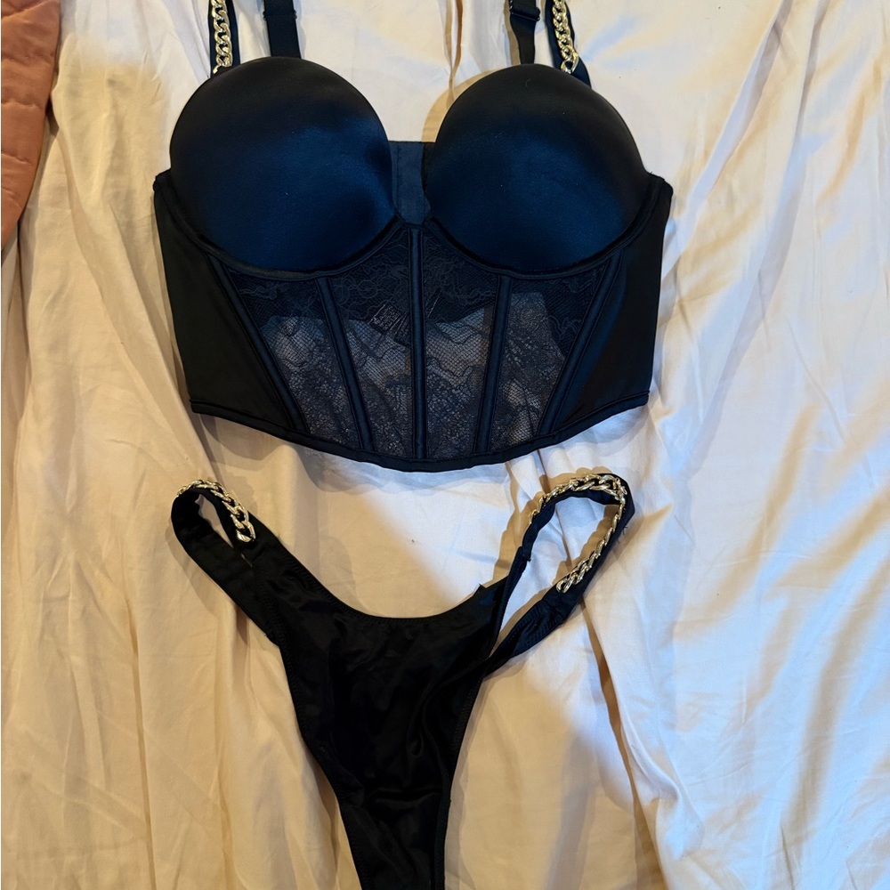 Victoria’s Secret Black Lace Bustier and Thong Set, top is 36B, panties medium.